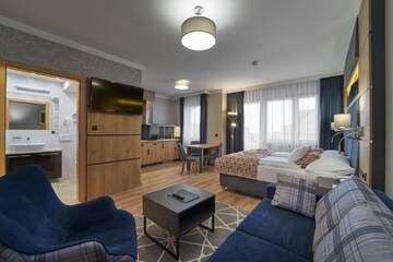 Фото номера Улучшенные апартаменты Отель Artus Resort г. Карпач 5