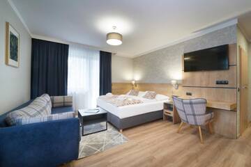 Фото номера Улучшенные апартаменты Отель Artus Resort г. Карпач 2