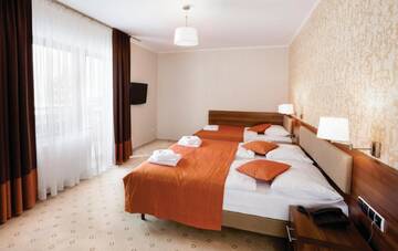 Фото номера Четырехместный номер Отель Artus Resort г. Карпач 2