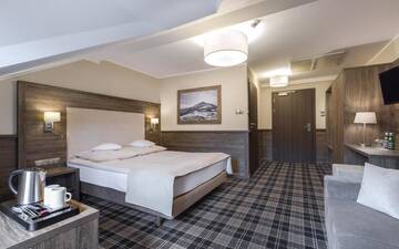 Фото номера Двухместный номер с 1 кроватью или 2 отдельными кроватями Отель Hotel Konradówka г. Карпач 24