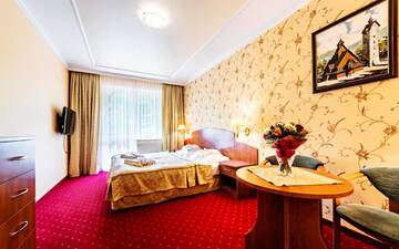 Фото номера Четырехместный номер Отели типа «постель и завтрак» Karkonoski SPA г. Карпач 3