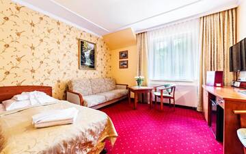 Фото номера Четырехместный номер Отели типа «постель и завтрак» Karkonoski SPA г. Карпач 4
