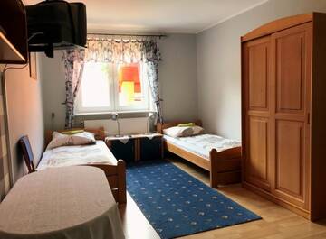 Фото номера Трехместный номер Проживание в семье Rezydencja Karnat г. Карпач 5