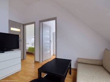 Фото номера Мезонет Апартаменты Apartament Karpatka 2 przy wyciągu narciarskim г. Карпач 44