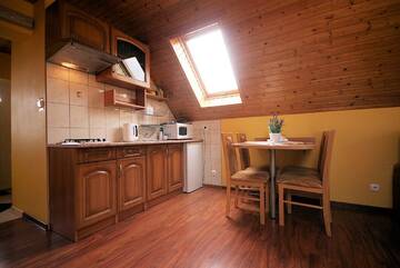 Фото номера Четырехместный номер Проживание в семье Apartamenty i Pokoje u Doroty г. Карпач 8
