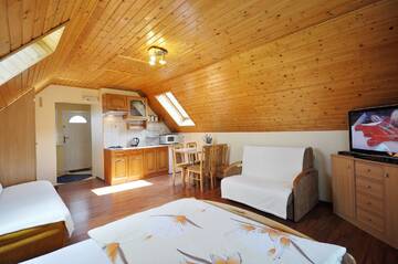 Фото номера Четырехместный номер Проживание в семье Apartamenty i Pokoje u Doroty г. Карпач 2