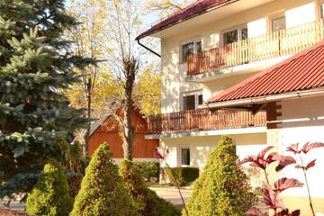 Фото номера Номер с кроватью размера «king-size» и видом на горы Проживание в семье Apartamenty i Pokoje- Gorski Widok / Mtn. View Inn г. Карпач 6