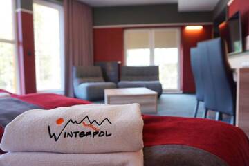 Фото номера Улучшенный четырехместный номер Отели типа «постель и завтрак» Villa Winterpol г. Карпач 6