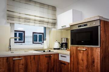 Фото номера Апартаменты с 2 спальнями Апарт-отели Alcatraz г. Карпач 11