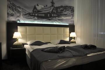 Фото номера Трехместный номер Отели типа «постель и завтрак» Villa Karpacz г. Карпач 2