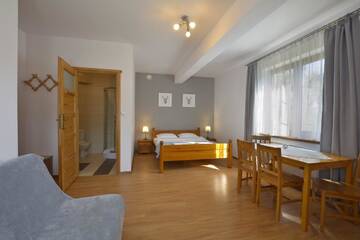 Фото номера Четырехместный номер Проживание в семье Maya Pokoje i Apartamenty г. Карпач 2