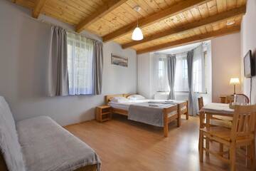 Фото номера Четырехместный номер Проживание в семье Maya Pokoje i Apartamenty г. Карпач 2